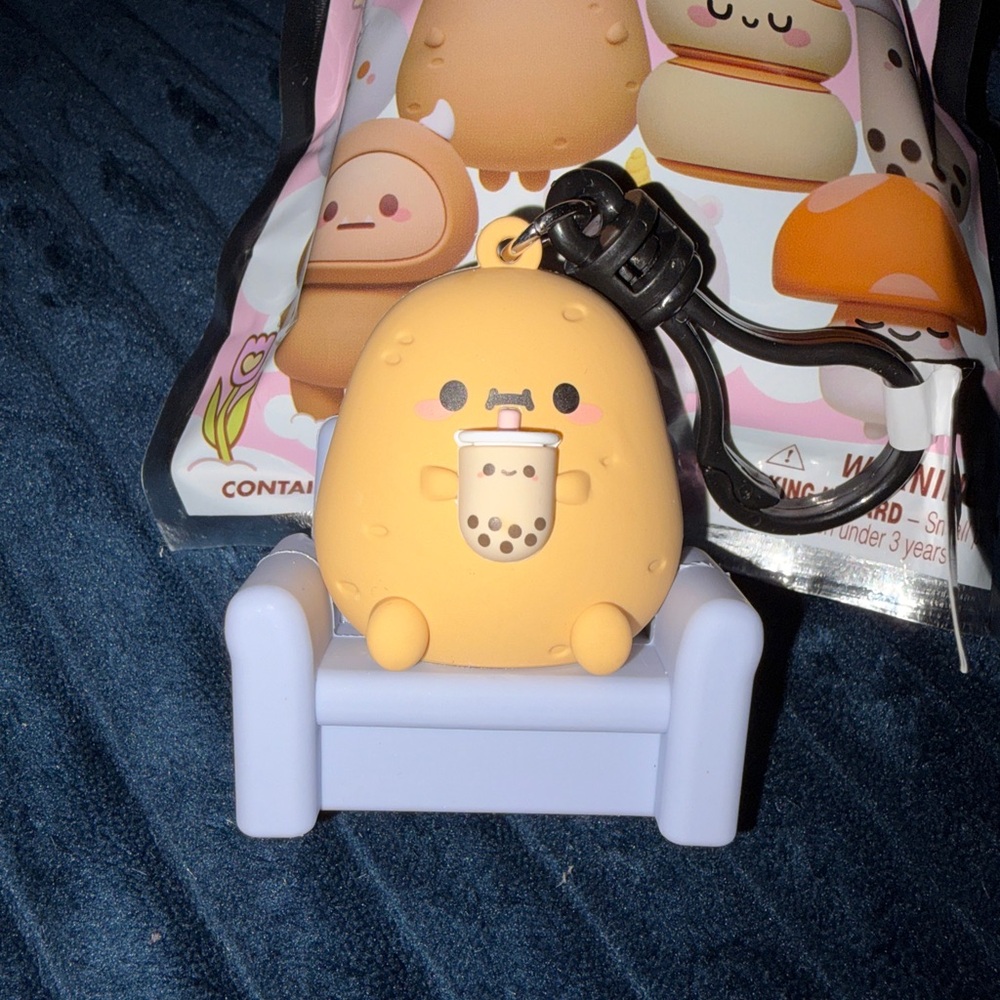 EXCLUSIVE SECRET Smoko Bag Clip- Tayto on Couch drinking Boba